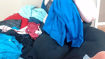 folding laundry in brassiere